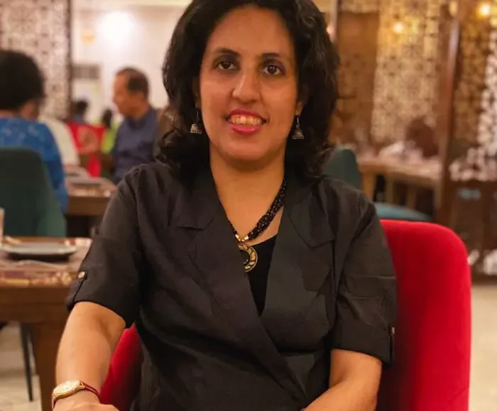 A person appearing to be sit on a chair, name - Yashi